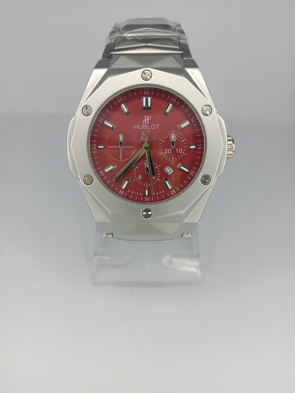 Hublot Reddish Dial Watch with Silver Accents